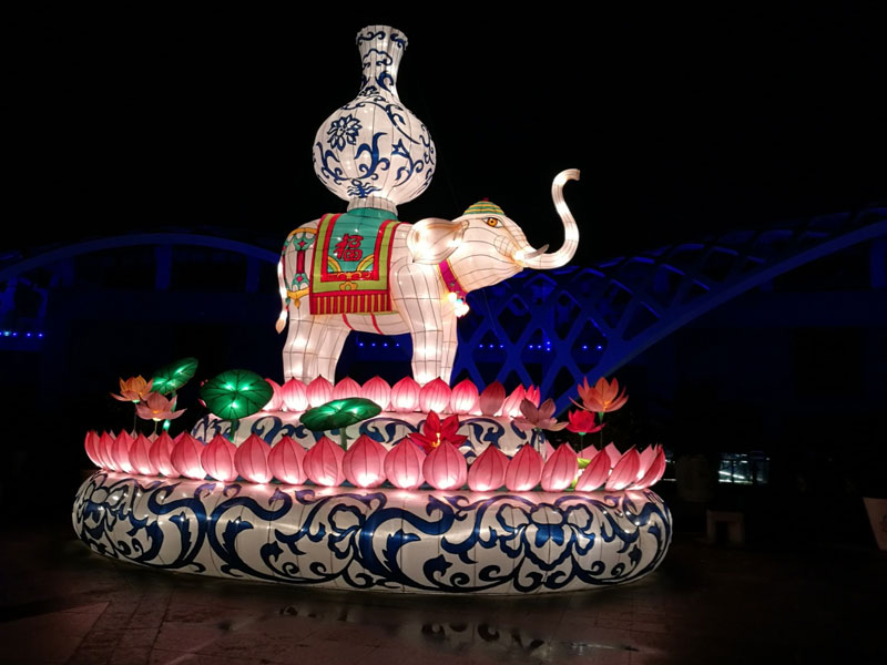 Elephant Holding Lantern